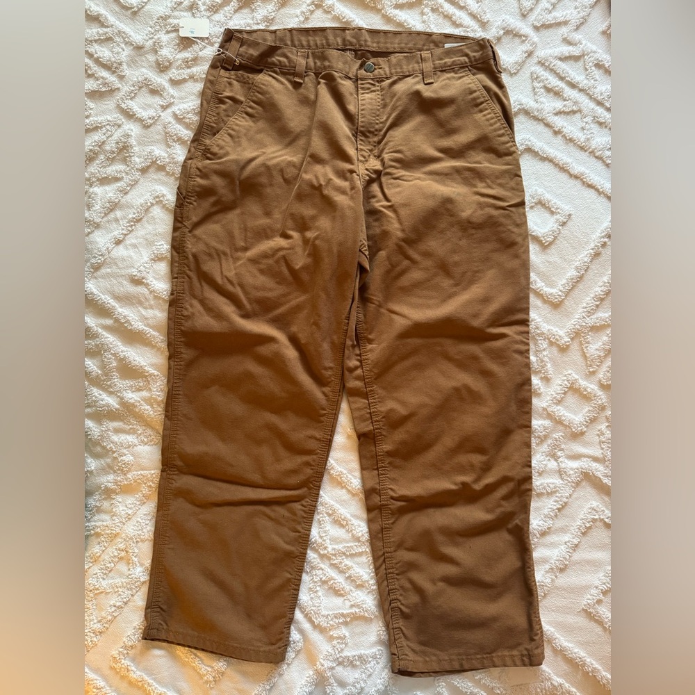 Carhartt Men's Tan Dungaree’s with Leather patch. Size 38x30